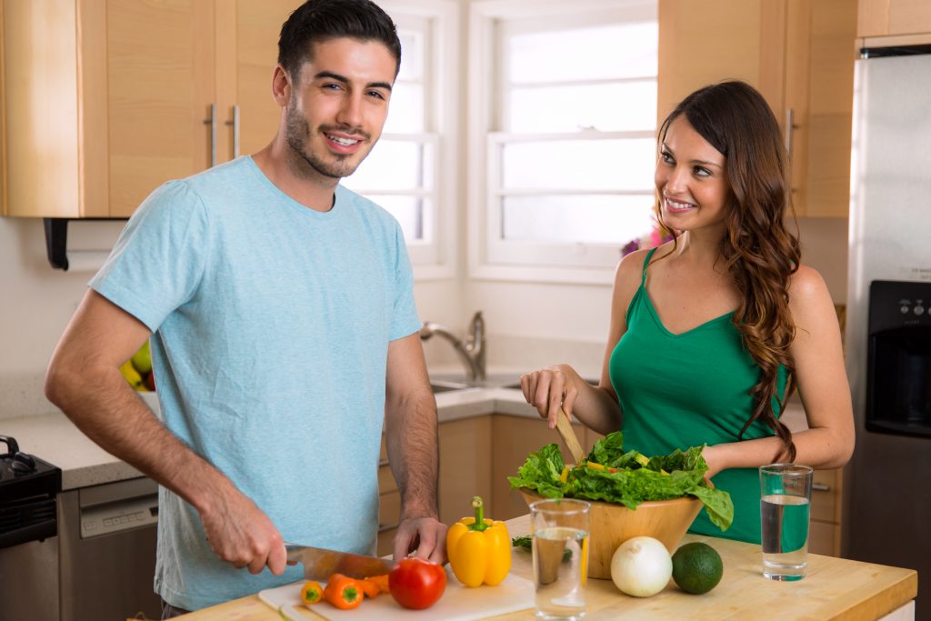 Couple Prepare Vegetables