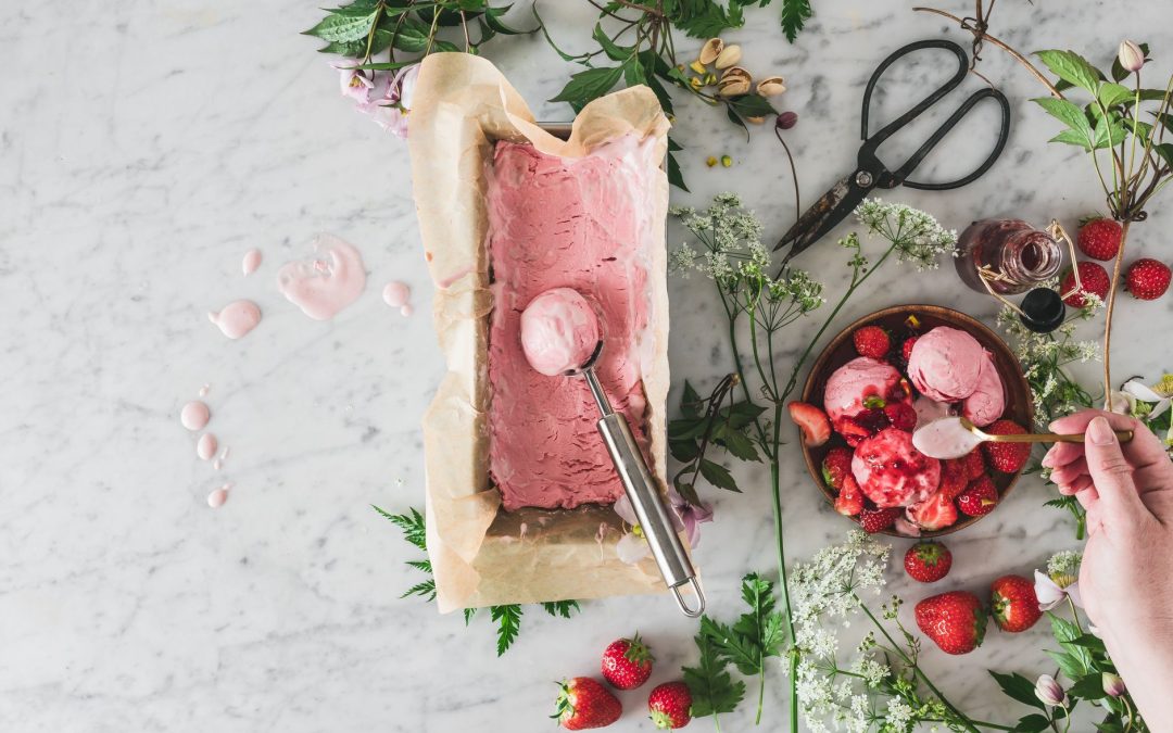 strawberry flavored ice cream with a scooper